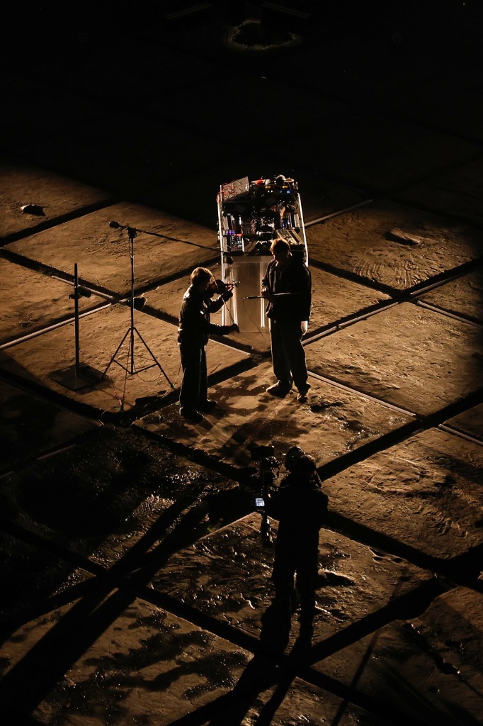 Top down view of two people at a DJ desk in Landschaftspark